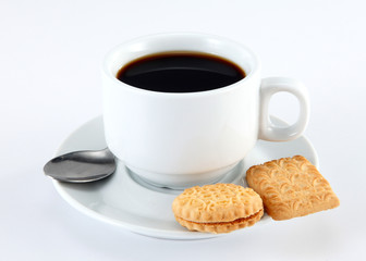 cup of coffee and cookies on plate