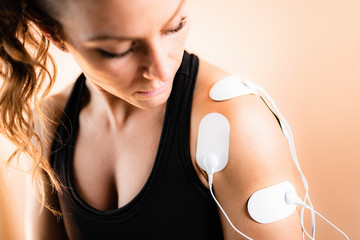 Shoulder Physical Therapy with TENS Electrode Pads, Transcutaneous Electrical Nerve Stimulation