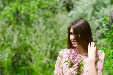 beautiful girl in a blooming Park