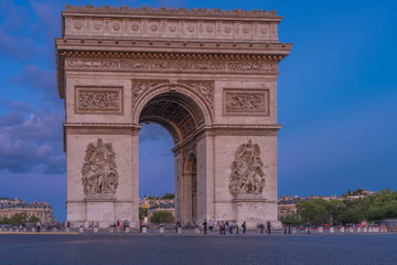 Fototapeta na wymiar Paris, France - 08 07 2019: Triumphal Arc of Paris at sunset