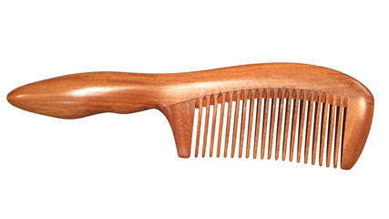 Sandalwood comb. Comb of sandalwood. Isolated image.
