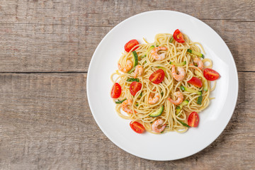 Pasta with shrimp and vegetables. The view from the top. Copy space.