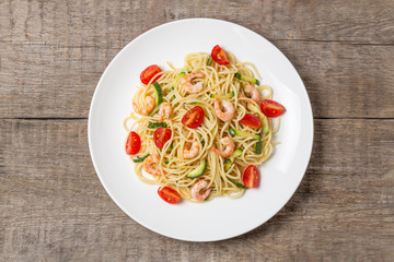 Pasta with shrimp and vegetables. The view from the top. Copy space.