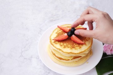 stack of pancakes with syrup