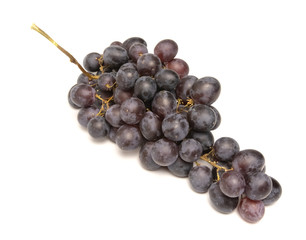 bunch of grapes lies on a white background