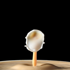 Milk drop splash in coffee milk