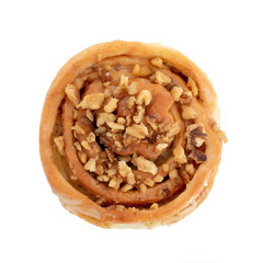 Top view of round bun with sprinkled with nut crumbs