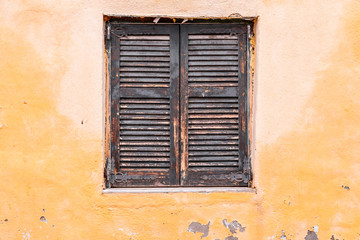 Windows with green wooden shutters