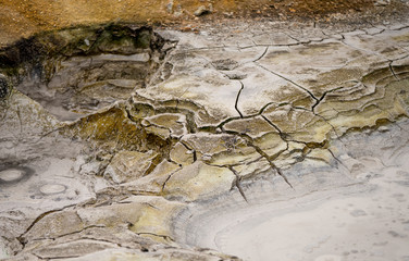 Dry multicolored mud field in Valley of Geysers. Kronotsky Nature Reserve in Russian far east,...