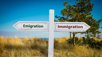 Street Sign Emigration versus Immigration