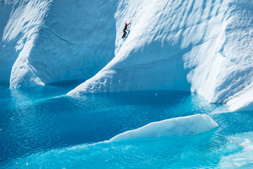 Climbing strange  shapes of ice cut from the Matanuska Glacier
