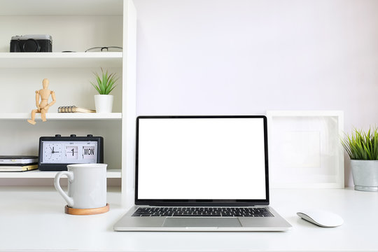 Workspace desk and laptop. copy space and blank screen. Business image, Blank screen laptop and supplies.