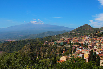 Fototapeta na wymiar View over Taormina to the Volcano Etna on the island of Sicily, Italy
