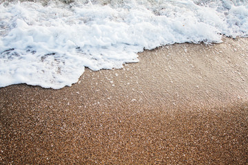 Black sea and cloud. Sea and sand