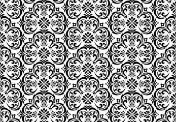 Wallpaper in the style of Baroque. Seamless vector background. White and black floral ornament. Graphic pattern for fabric, wallpaper, packaging. Ornate Damask flower ornament