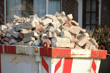 Loaded garbage dumpster