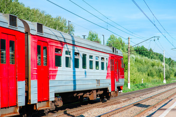 Naklejka premium Electric train pulls up to the station platform
