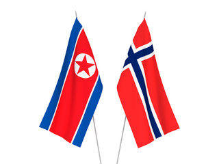 National fabric flags of Norway and North Korea isolated on white background. 3d rendering illustration.