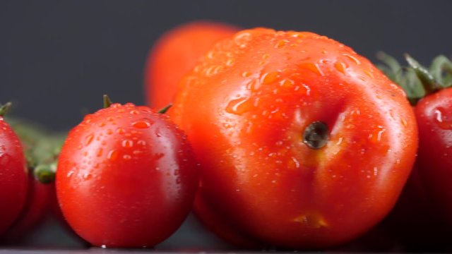  Different tasty ripe tomatoes, close-up traking shot. Filmed in 4K