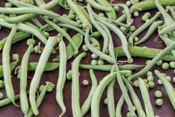 A set of green vegetables: peas, asparagus, top view