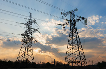 High-voltage power lines. Electricity distribution station. high voltage electric transmission tower. Distribution electric substation with power lines and transformers