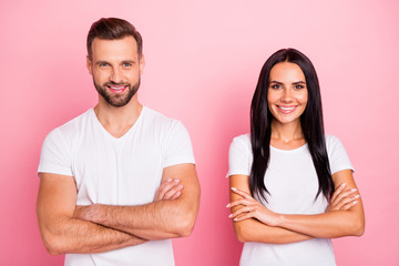 Fototapeta premium Portrait of his he her she two nice-looking attractive lovely charming cute cheerful cheery content spouses folded arms isolated over pink pastel background