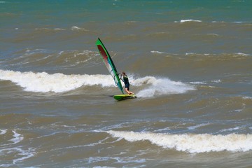 Windsurfer riding on the Black sea, Russia.