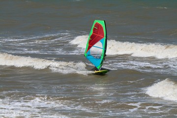 Windsurfer riding on the Black sea, Russia.