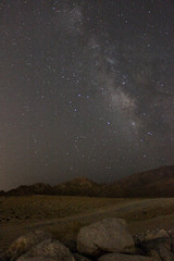 Milky way constellation in desert portrait