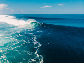 Aerial view of big wave surfing in Bali. Big waves in ocean