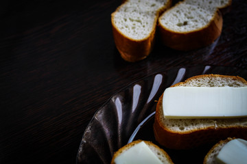 Cheese sandwiches and two slices of white bread without cheese