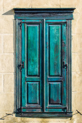 turquoise window in cream color area