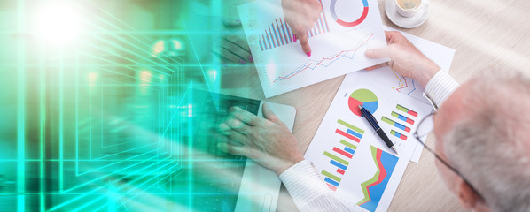 Discussing business graphs; multiple exposure