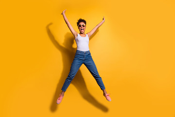 Full length body size photo beautiful she her dark skin excited lady jumping high scream shout yell...