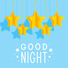 Paper stars on blue background - good night concept