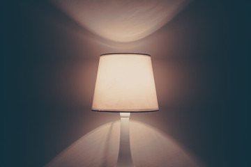 lamp on the wall. table lamp with warm light.