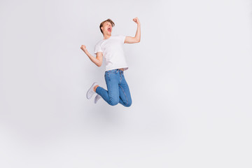 Full body photo of jumping high guy wear casual outfit isolated white background