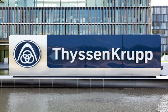 Essen, Germany - September 1, 2011: ThyssenKrupp logo in front of the headquarter building. 