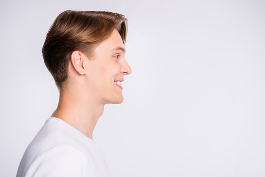 Close-up profile side view portrait of his he nice-looking cute attractive cheerful cheery glad guy copy space isolated over light white pastel background