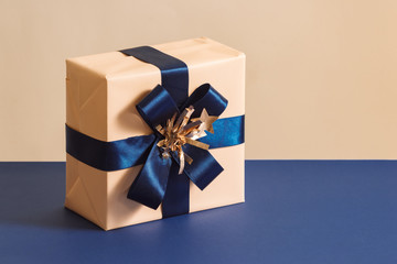 Christmas or Birthday box isolated on blue background