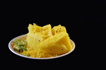 Khaman Gujarati breakfast in Plate with Black Background