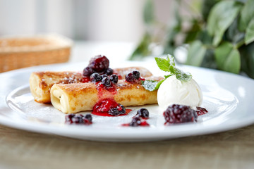 pancakes with berries and ice cream