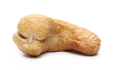 Salted and roasted cashew nut isolated on white background