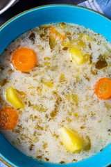 Polish sour cucumber soup or salt cucumber soup.