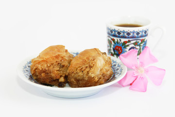 traditional oriental turkish arabic sweet baklava and cup of coffee