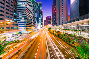 Fototapeta na wymiar Building and traffic in Hong Kong at sunset time.