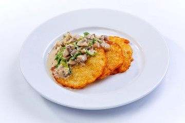 potato pancakes with mushroom sauce