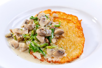 potato pancakes with mushroom sauce
