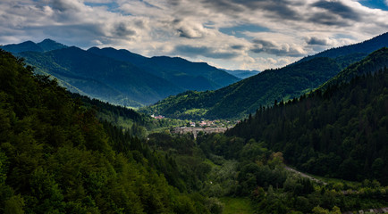 Fototapeta na wymiar Village between mountains