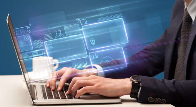 Hand typing on laptop with online accounting system concept